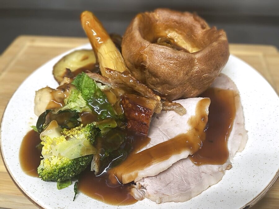 Sunday lunch with pork and Yorkshire pudding at The Lockoford