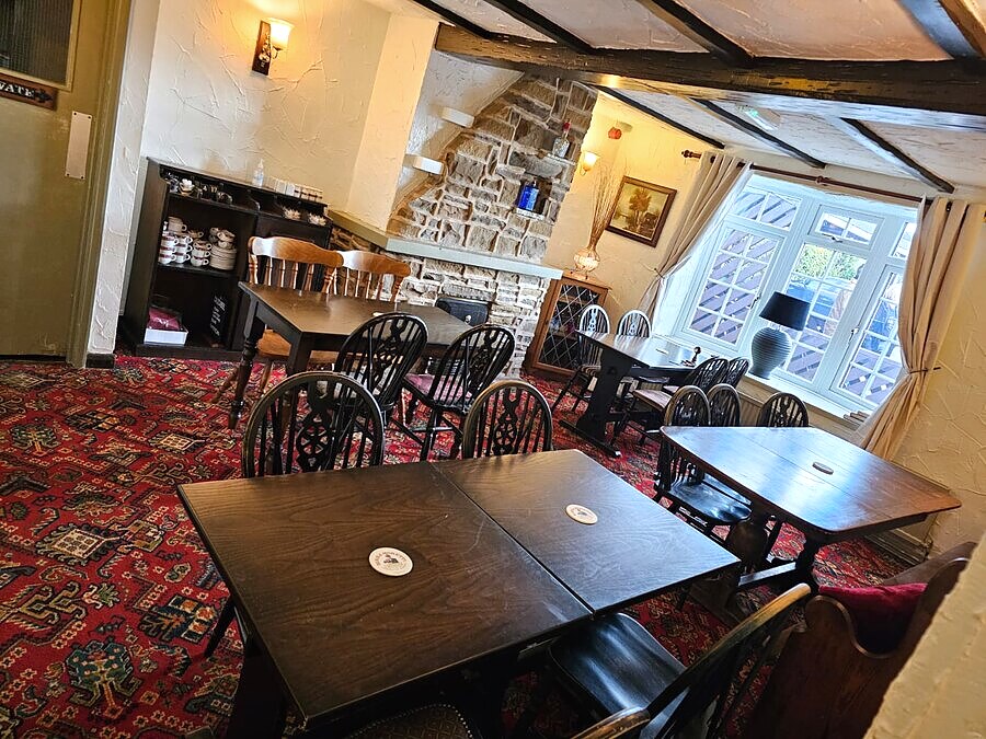 Snug room seating inside The Lockoford